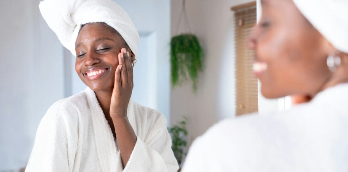 Skincare, face and cosmetic cream of a woman using facial beauty products morning self care.